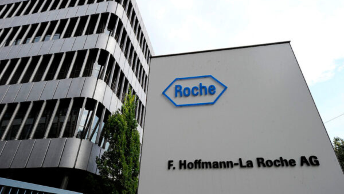 Roche corporate sign in front of modern office building on a clear day